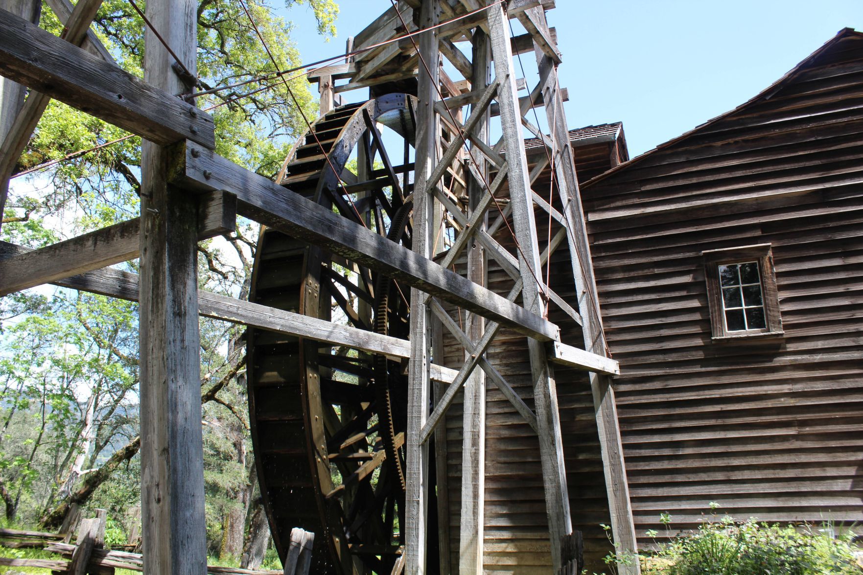 The overshot flume and waterwheel of the Bale Grist Mill in the Napa Valley